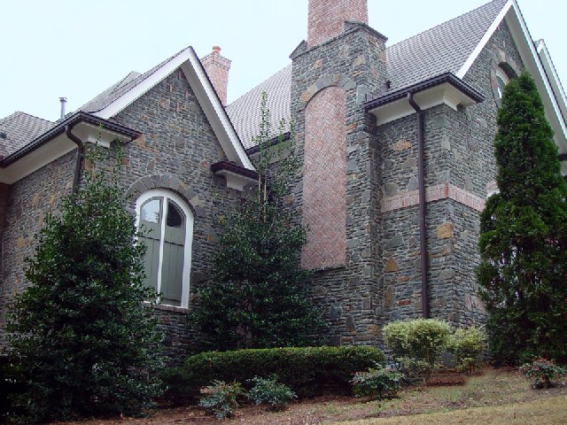 Exterior walls in Pennsylvania Fieldstone with Cut Arches