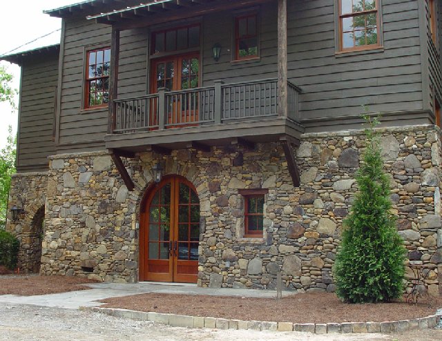 Exterior walls with Smokey Mountain River Rock Dry Stacked