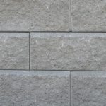 A close-up shot of the Allan grey wall block