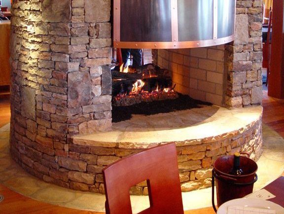 indoor natural stacked stone fireplace